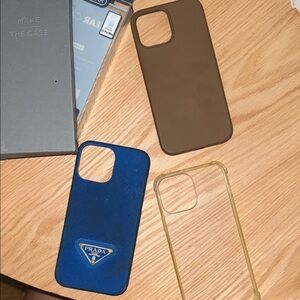Three iPhone 13 Pro Max phone cases.